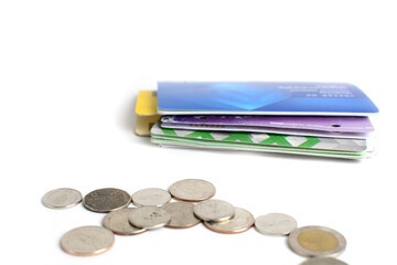 Passbook and coin on the white background.