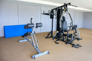 Fototapeta na wymiar Gym equipment in gym room for exercise.