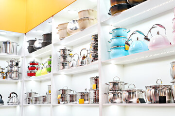 Metal stainless steel pots and teapots in store
