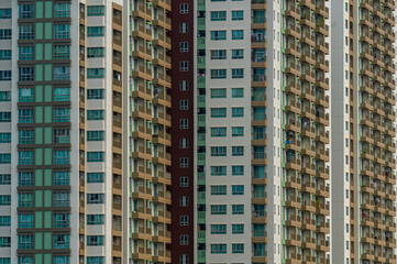 Beautiful pattern from many windows and balconies apartment building, Exterior building facade of modern apartments.