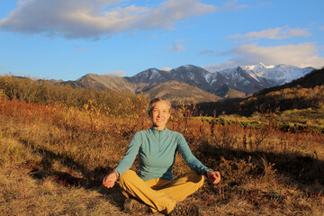 Trekking around volcanoes of Kamchatka in fall season. Northern pristine nature.