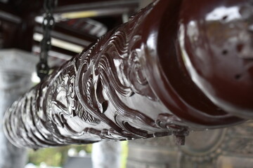 Wooden Buddhist Bell Striker with Dragon Relief Carvings, Con Dao, Vietnam (Foreground R)