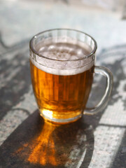 Old Soviet beer mug with beer.