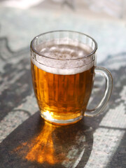 Old Soviet beer mug with beer.