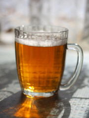 Old Soviet beer mug with beer.