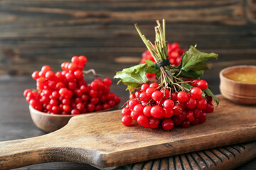 Fresh viburnum berries on table