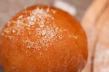 homemade pastry bun close-up, copy space, use as background