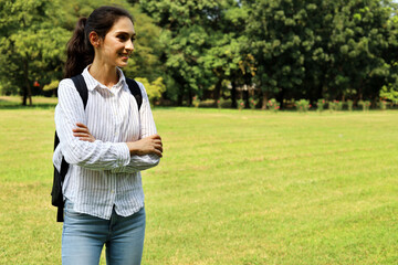 Happiness young woman smile freedom and relaxation at garden in holiday weekend.