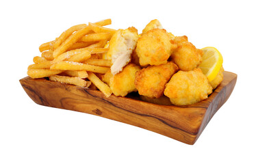 Tempura battered chicken nuggets and French fries in an olive wood serving dish isolated on a white background