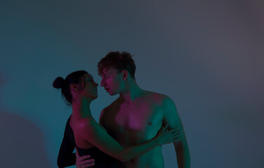 Sensual couple. Man and woman posing studio. Couple love. 