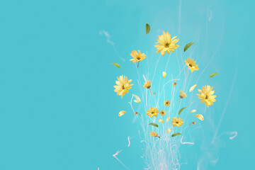 Bouquet of yellow flowers in the form of fireworks on a blue background with copy space.