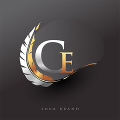 Initial letter CE logo with Feather Gold And Silver Color, Simple and Clean Design For Company Name. Vector Logo for Business and Company. - obrazy, fototapety, plakaty