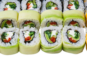 Sushi set with cheese, rice, nori, cucumber and avocado isolate on white copy space