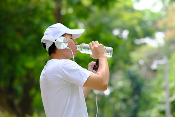 Man holding bottle of water and health care concepts