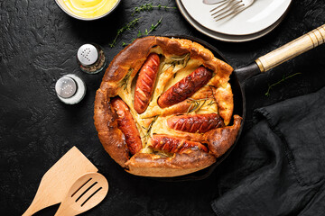 Toad in the hole, Sausage Toad, traditional English dish of sausages in Yorkshire pudding batter....
