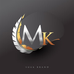 Initial letter MK logo with Feather Gold And Silver Color, Simple and Clean Design For Company Name. Vector Logo for Business and Company.