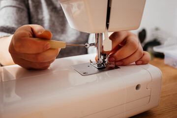 Professional seamstress can fix her modern sewing machine