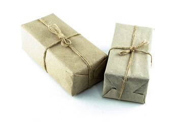 pair of giftbox in brown kraft paper on isolated background