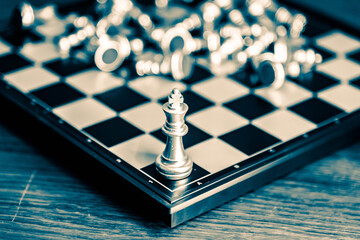 Chess board game to represent the business strategy with competition in the world market. and find...