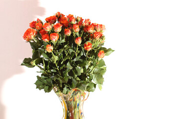 Bouquet of red roses on a white background. Designer bouquet for a wedding close-up.