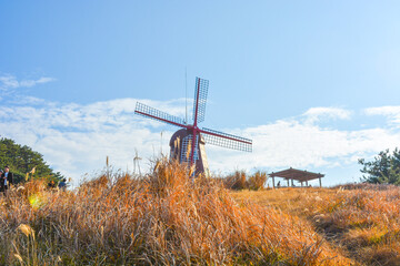 A windmill like Dutch on a windy hill in Geoje Island of Korea