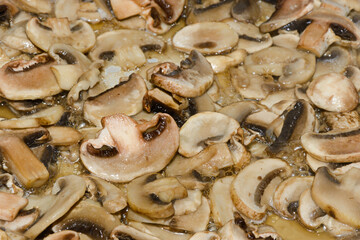 Chopped fragrant mushrooms are fried in vegetable oil
