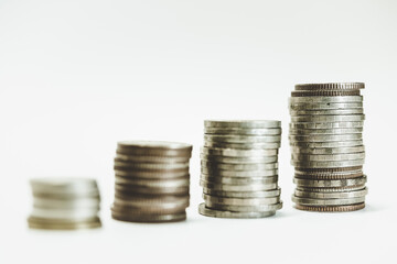 Gold coins stacks is representing riches and wealth management. Coin stack growing and find out the way to get a return on investment. Finance and money exchange investment as concept.