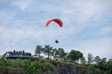 Paragliding in Holmestrand, city of Norway.