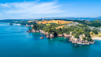 Aerial view of a beautiful harbour with rocky coastline. Coromandel, New Zealand.