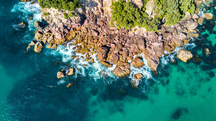 Aerial view on a rocky ocean coast. Coromandel, New Zealand.