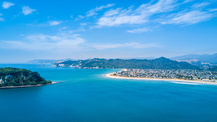 Little Town on the shore of a beautiful harbour. Coromandel, New Zealand.