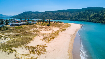 Aerial view of a sunny beach. Coromandel, New Zealand.