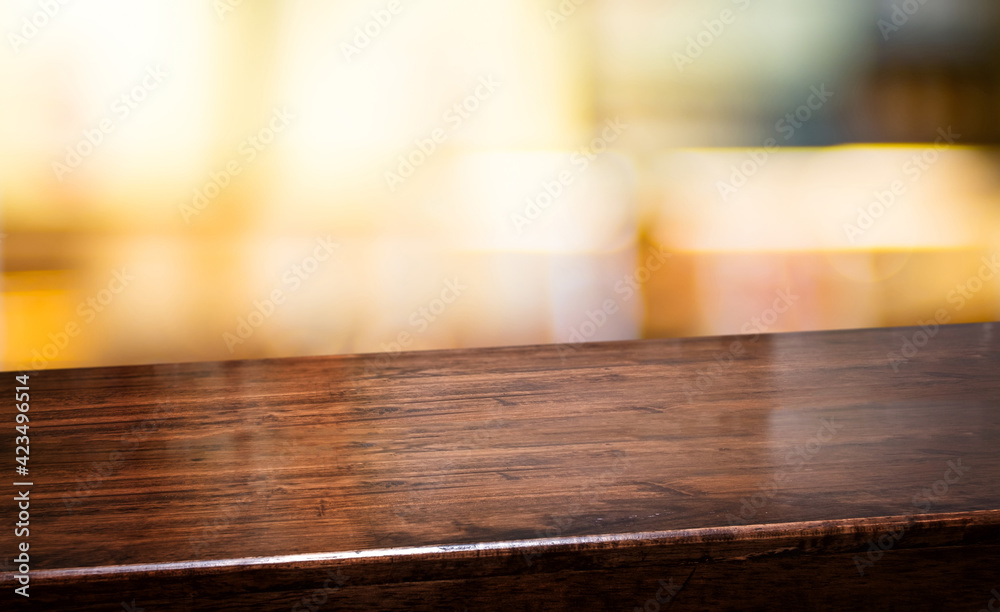 Aufkleber bar nightclub background.empty diagonal brown wooden table with blur bar restaurant bokeh lights,ban