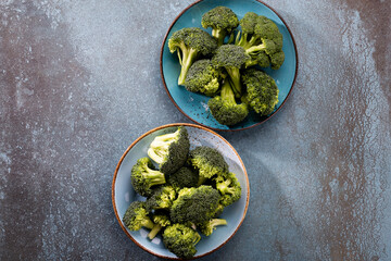 Fresch Broccoli slices on plate.