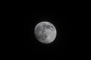 Plakat full large moon on a black background at night. full moon