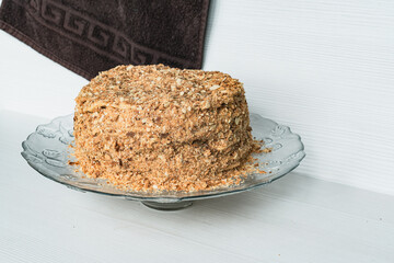 A whole napoleon cake on a light background.