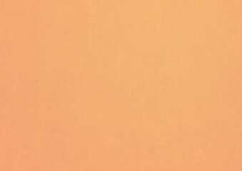 Fototapeta premium Pale orange paper texture background