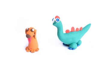 Hand made figurines, funny creatures made of plastic mass, modeling clay. Fancy, colorful characters.