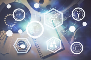 Double exposure of social network theme drawing and work table top veiw. Concept of international connection.