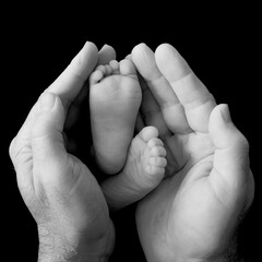 Together - mother, father and child holding hands