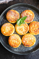 healthy food cheesecake sweet curd breakfast syrniki dessert cottage cheese pancakes healthy meal top view copy space rustic food background image