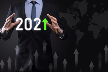 Plan business positive growth in year 2021 concept. Businessman plan and increase of positive indicators in his business, Growing up business concepts.