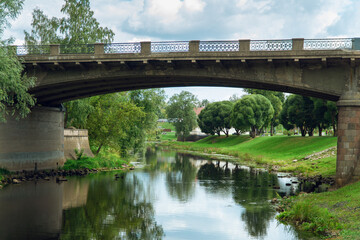 view of the Soviet bridge and park in Pskov in summer