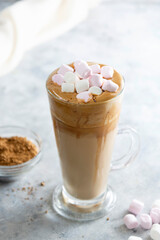 Chocolate shake with whipped coffee and marshmallows. Cold summer drink.