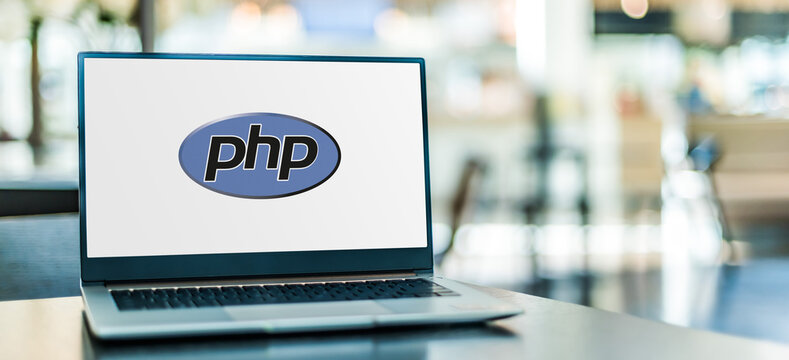 Laptop computer displaying logo of PHP