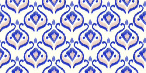 Ikat vector seamless pattern in modern Bohemian style. Ogee textile design