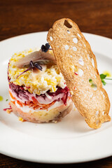 salad with herring and vegetables