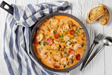 seafood saute in a pan, top view