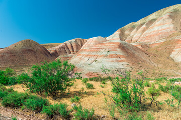 Cross-bedding in Candy Cane Mountains in Azerbaijan. Colorful stripes of the hills. Shale striped mountains.