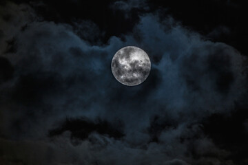 Fototapeta na wymiar Full Moon, Supermoon, Worm Moon with Cloud Cover
